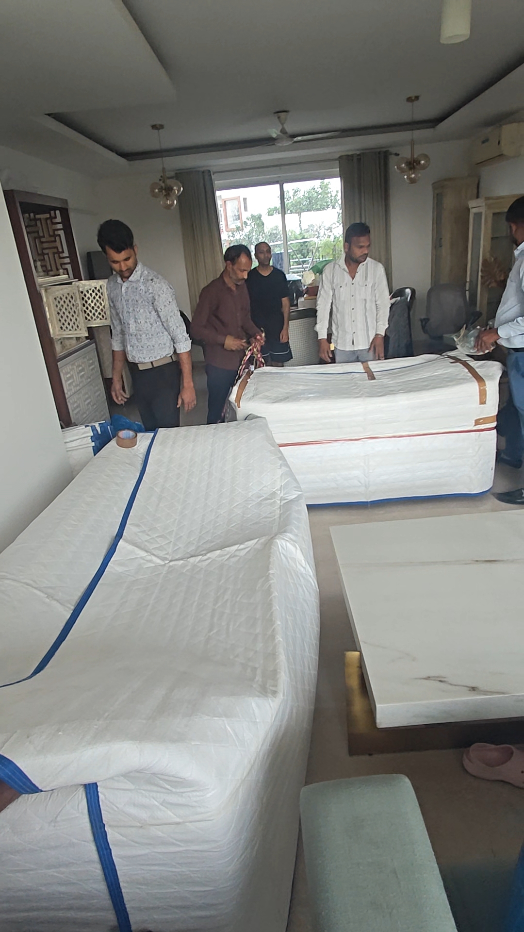 Perfect Packers Movers team professionally packing household items in Delhi